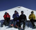 Climbers rest at the bottom of Misery Hill, 13,200 ft. Mt. Shasta