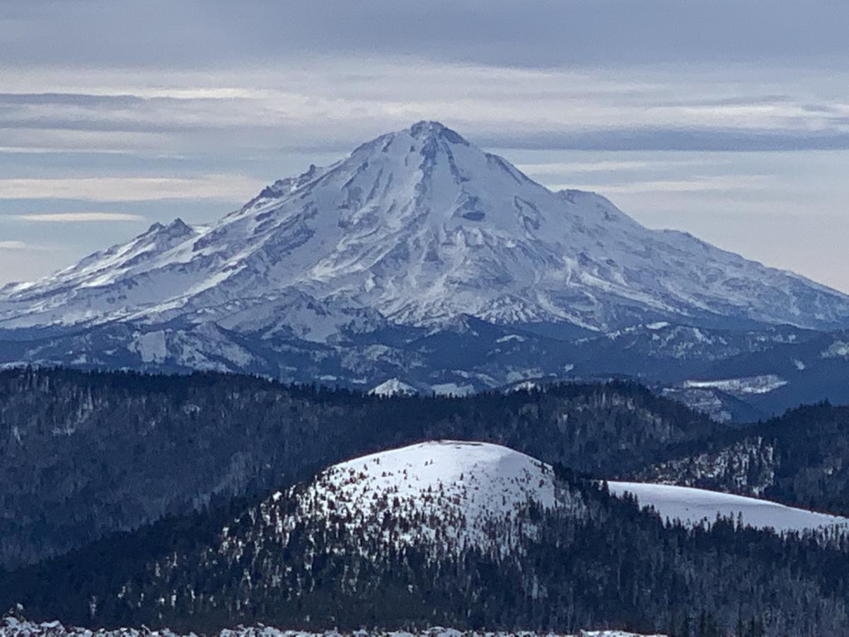The east side of Mt Shasta with Pumice Stone Mountain in the foreground. The view is along the northeast  crest, a high line that connects Mt Shasta with Medicine Lake and typically collects more snow and is colder than most locations in the area.