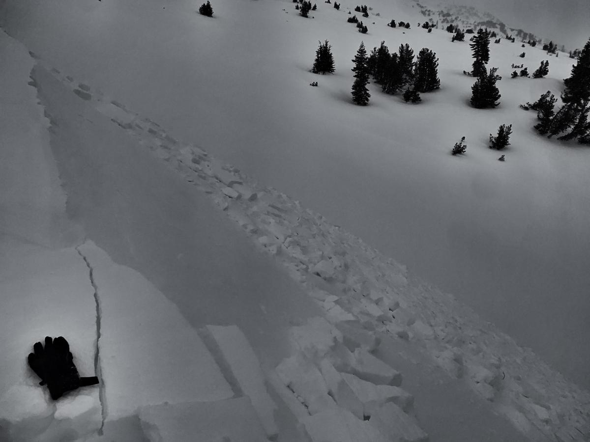 Wind slabs like this one were easily triggered on small, easterly facing slopes. Photo color enhanced due to flat light.