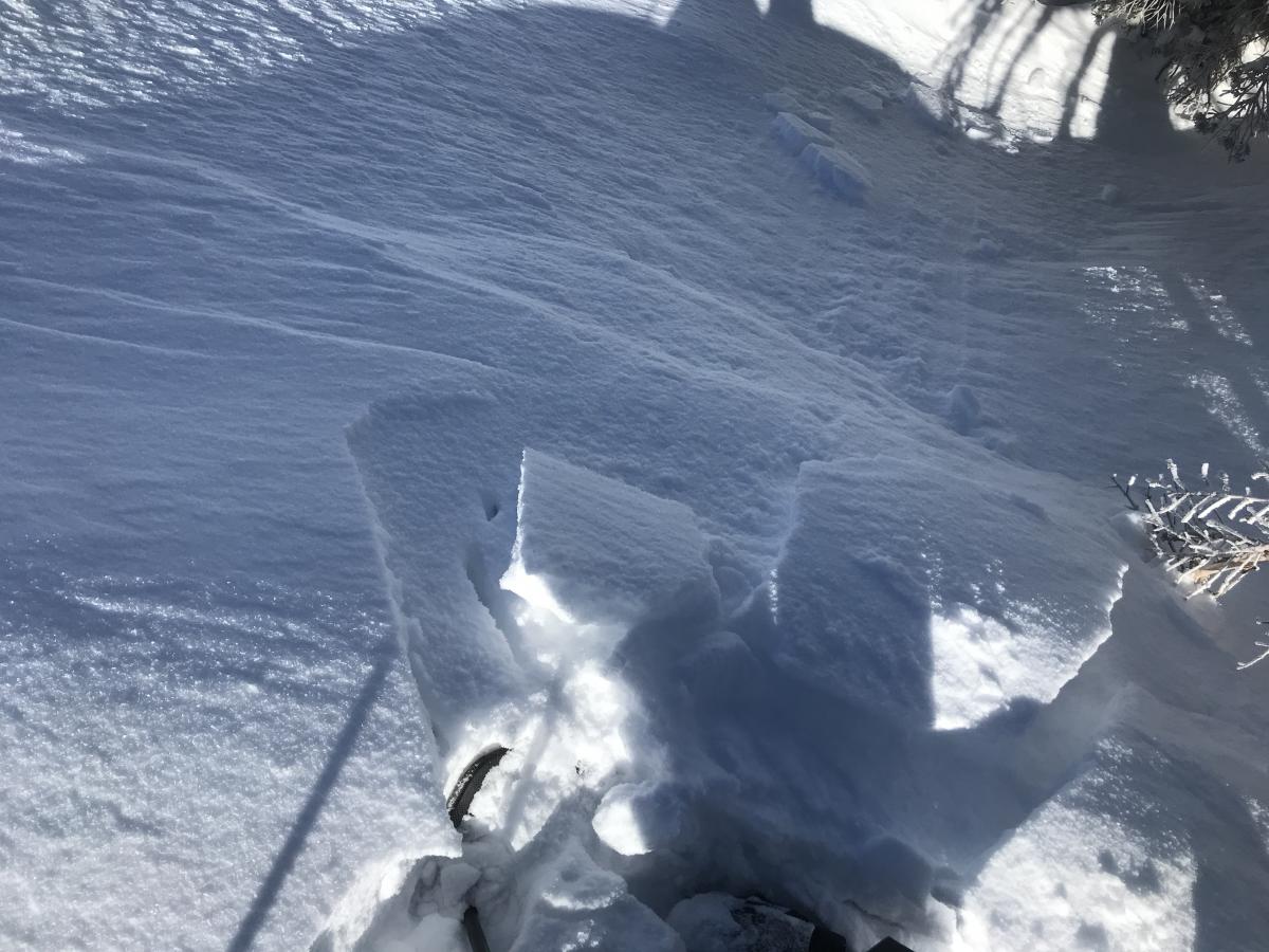 Small, wind slabs that easily fractured within the top 6 inches of snow on small test slopes