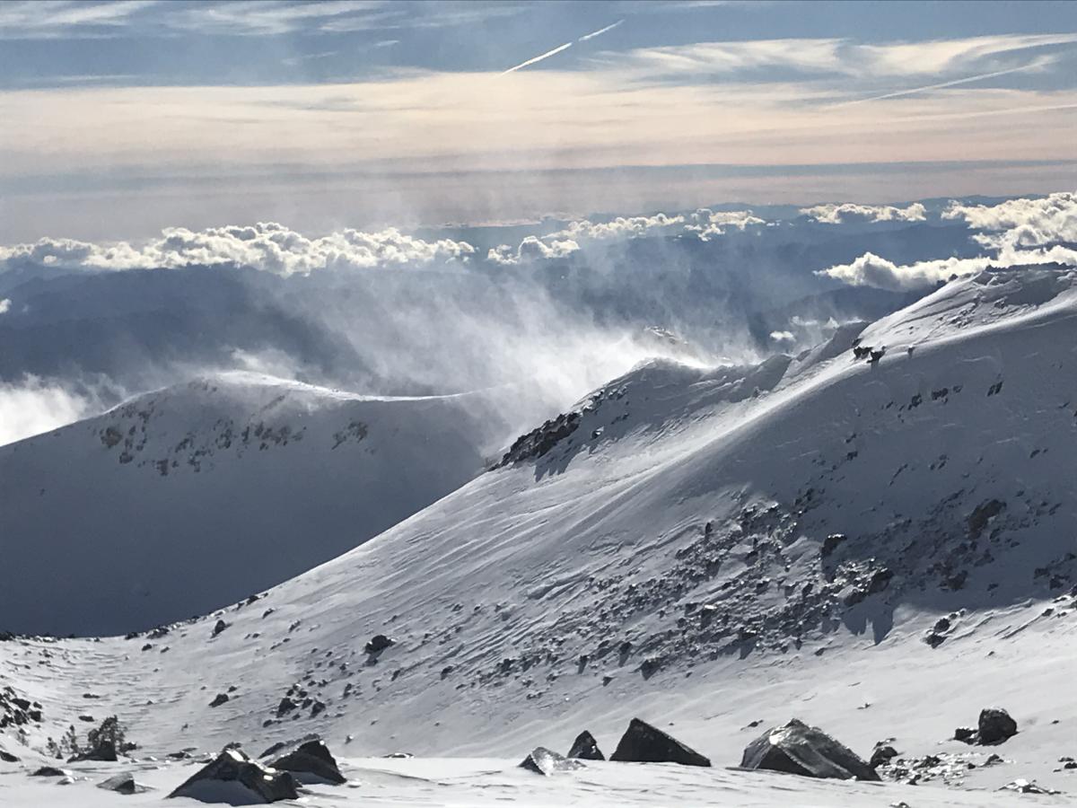 W-NW winds were actively blowing snow on the mountain today (12.21.18), though most was sublimating into the atmosphere.