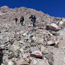 Climbers moving beyond UFO Rock.