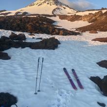 Clipping into our skis at our camp at 10,100 feet. These patches of snow will melt quickly and likely be gone by next week. 