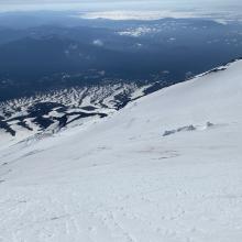 Looking down the Hotlum Glacier from near 12,50 feet shortly after skiing over the upper bergshrund. 