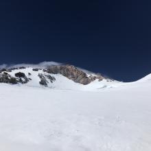 The bergschrund below the Hotlum Headwall is open and spans across the top of the glacier