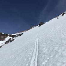 Firm conditions warrant an ice axe and crampons 