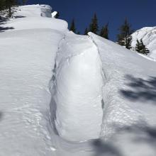 cornice crack indicating settlement near treeline on northeast ridge 