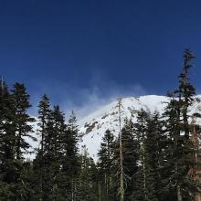 Snow being blown onto southwest aspects