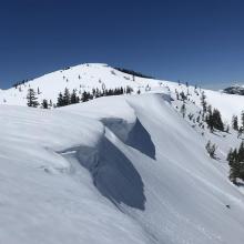 Drooping overhung cornices on northeast ridgeline 