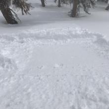 slick crust beneath new snow 