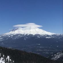 Mount Shasta capped by lenticular clouds 