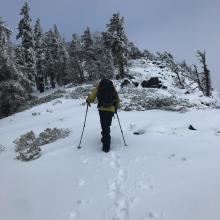 Making our way up the ridge to the weather station, just an inch or two of new snow on top of firm, old snow. Windy.