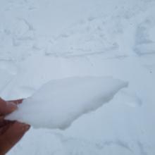 Widespread breakable ice layer, sometimes exposed, sometimes covered with drifted snow