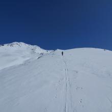 Thin snow on top of ridges above treeline