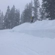 Wind drifts breaking off snowbank at Castle parking area