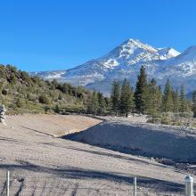 North side at the Whitney Creek and Hwy 97 crossing