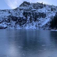 Frozen lake with Middle Peak in the background