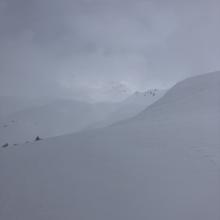 Brief gimps of above tree line conditions. Note: Generally smooth surface texture with some wind effect on the ridges.