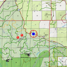 Blue dot representing the end of the line approximately on the Military Pass road