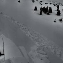 Wind slabs like this one were easily triggered on small, easterly facing slopes. Photo color enhanced due to flat light.