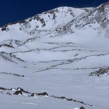 The upper mountain viewed from the Old Ski Bowl. High wind was evident on the upper mountain from the obvious stream of spindrift streaming off ridgelines.