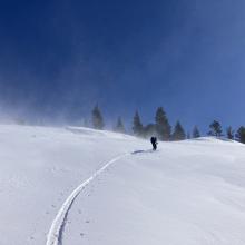 Eric crossing through wind transported snow