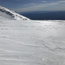 Smooth, glazed snow surfaces at Helen Lake