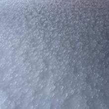 Icy glaze near treeline on top of snowpack