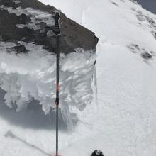 Thick rime/water ice on rocks near ridge lines at upper elevations