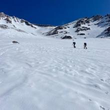 Skinning up above Helen Lake in Avalanche Gulch, approaching The Heart and Redbanks