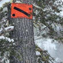 Snow survey sign - these identify course locations and survey path