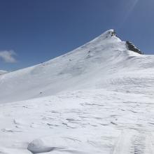 A easterly, wind affected area above treeline, snow surface example.