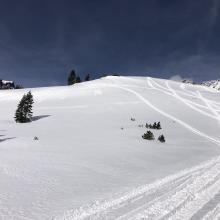 Warming temps in the afternoon. Note roller balls triggered on south-facing slope. 