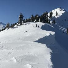 Large, hard cornices hanging over the north side of the Northeast Crest