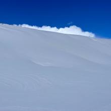 Wind slab on a low angle test slope, location of pit